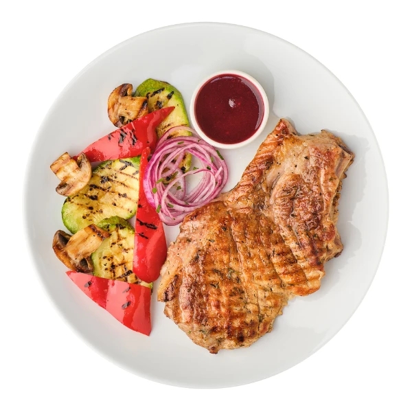 Свинина на кістці з овочами гриль